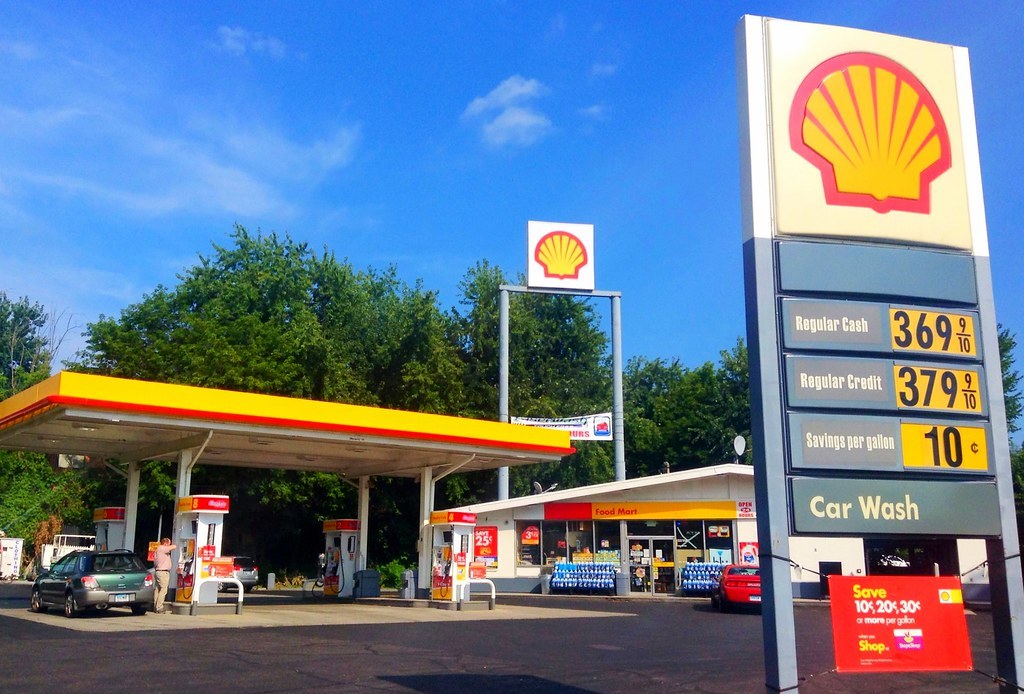 A Shell station with its canopy, pumps and convenience store